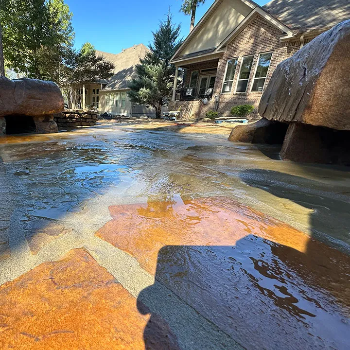 Close-up of granite, porcelain, and brick paver stones showcasing their textures and colors
