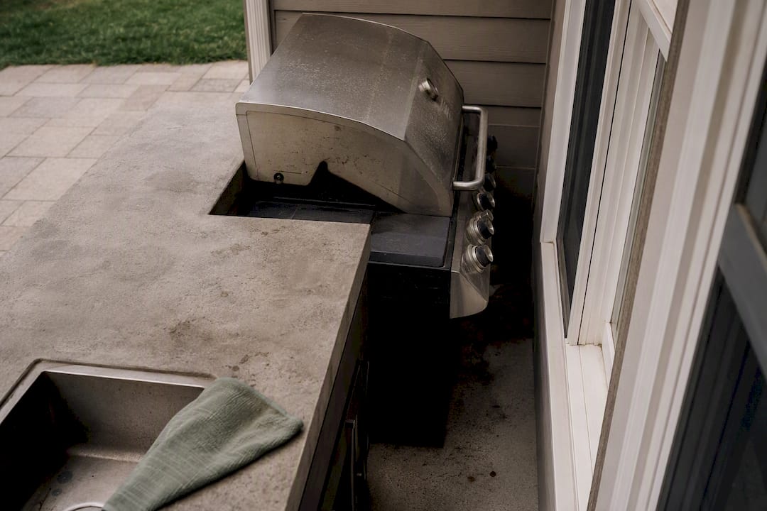 Cramped patio grill zone highlighting common sizing mistake
