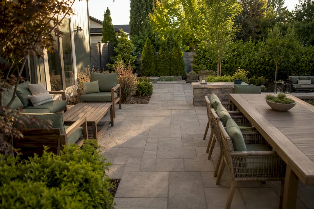 Large patio with dining and lounge zones separated by service aisle