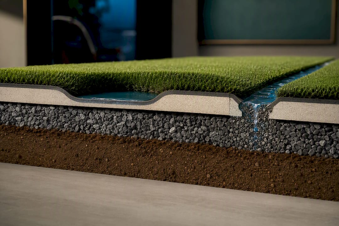 Cutaway showing turf base drainage failure