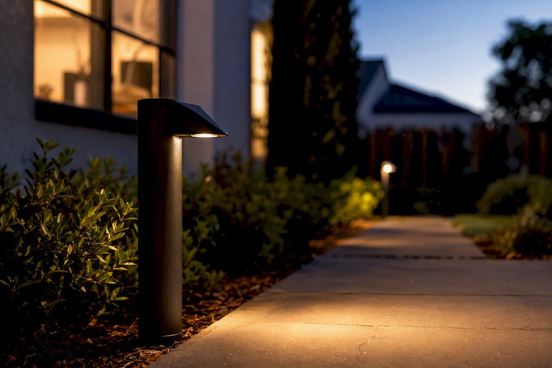 Shielded path light directing warm light downward