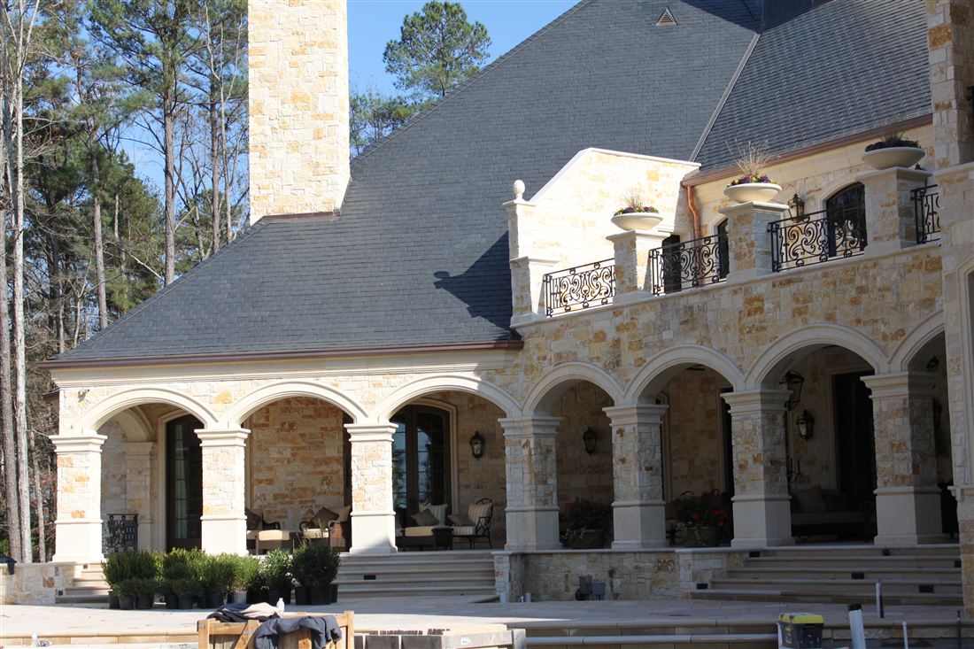 Arched loggia, cut limestone columns and arches