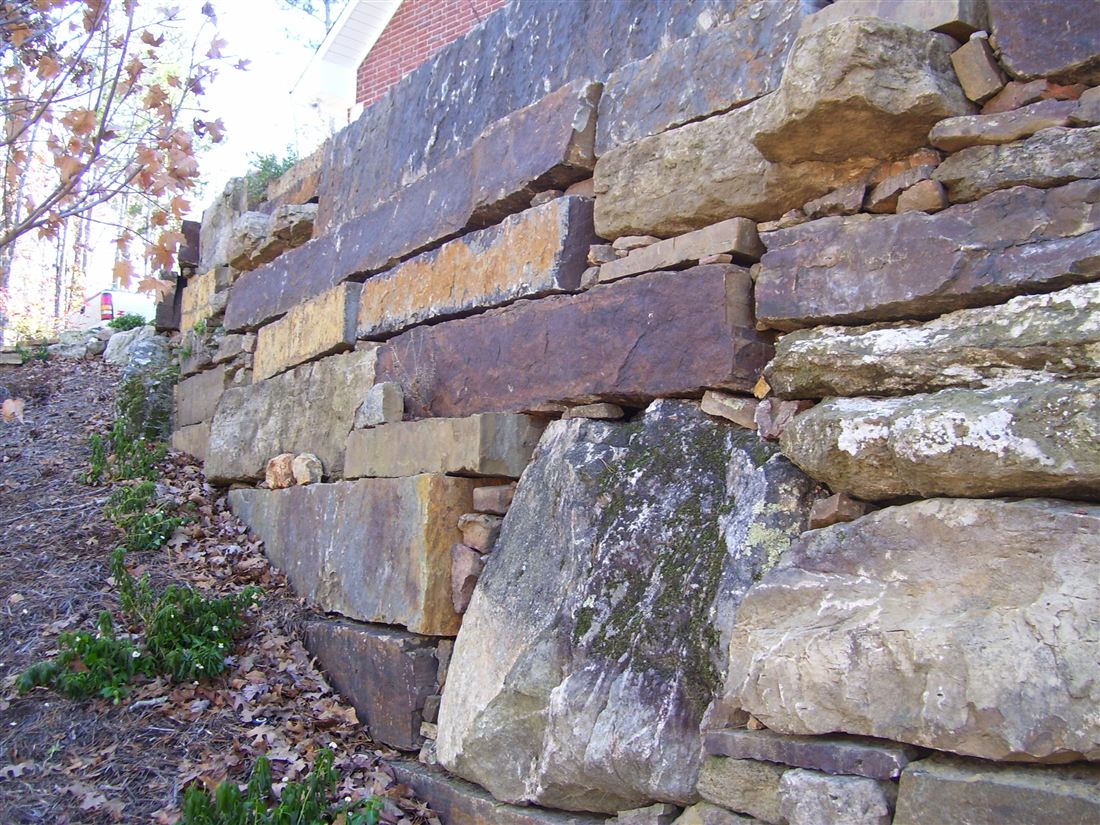 Boulder and ledge wall, planted