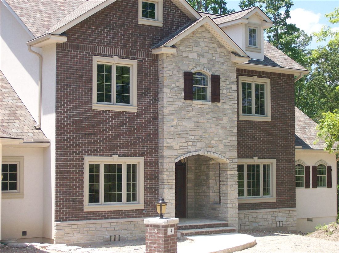 Brick and limestone, two-story