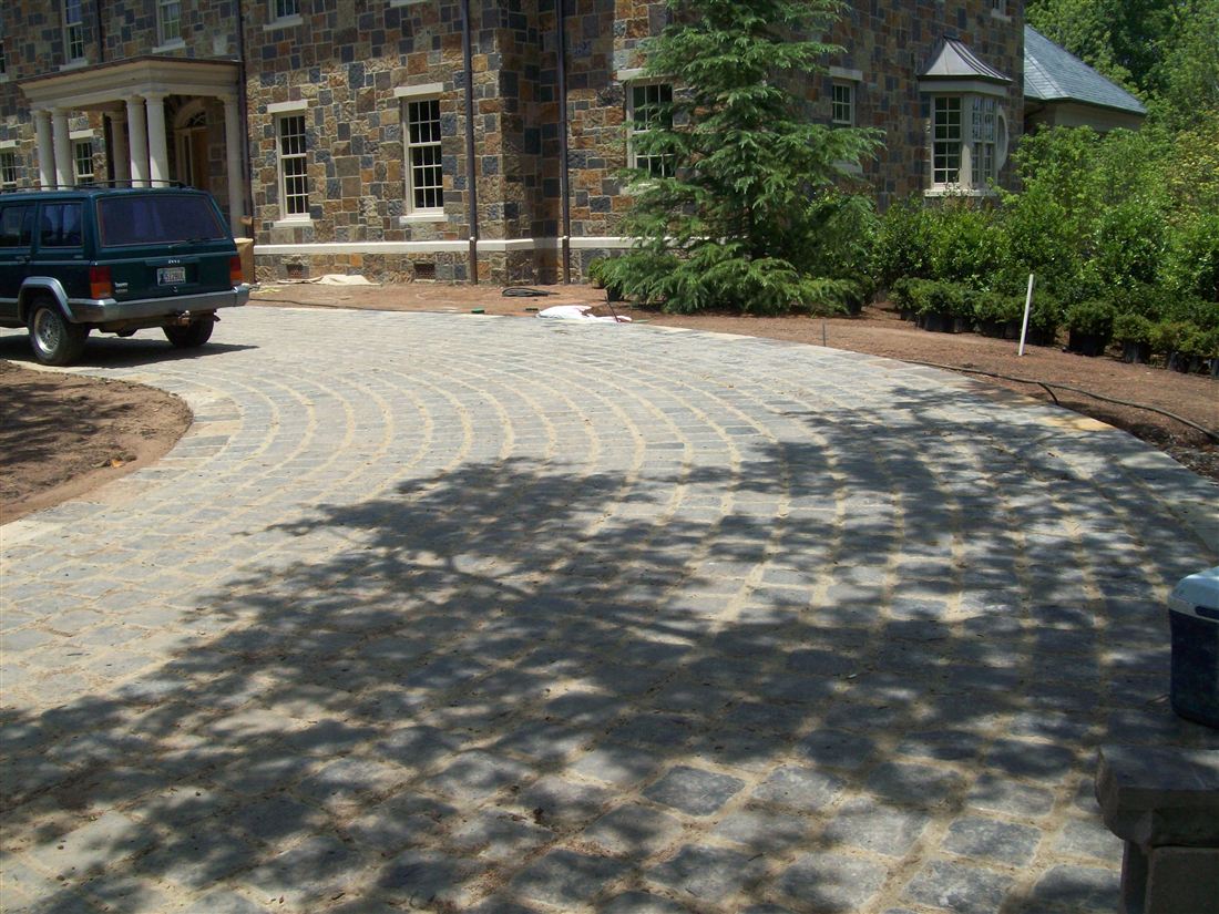 Cobblestone circle drive, stone manor