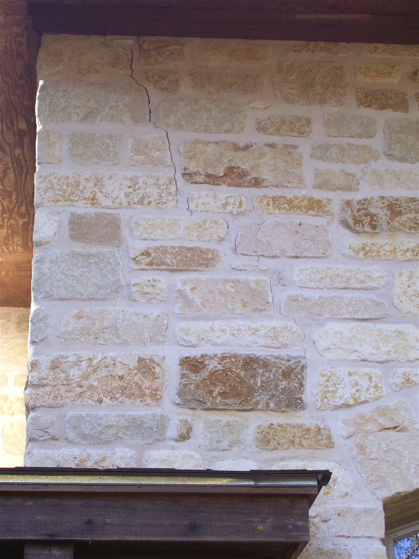 Cream limestone, corner detail under the eave