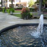 Cut-limestone plaza, with fountain