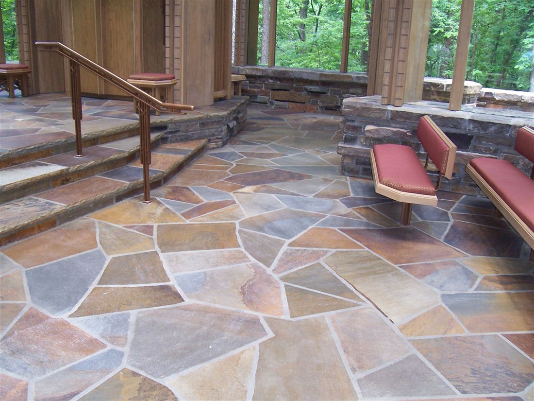 Cut-slab steps with copper rail, flagstone landing