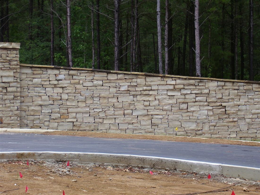 Dry-stack limestone, with entry columns