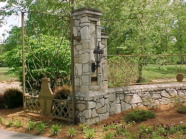 Entry column, lantern and low wall