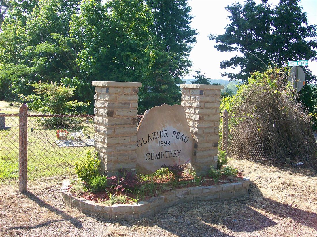 Glazier Peau Cemetery, 1892, engraved boulder with stone columns
