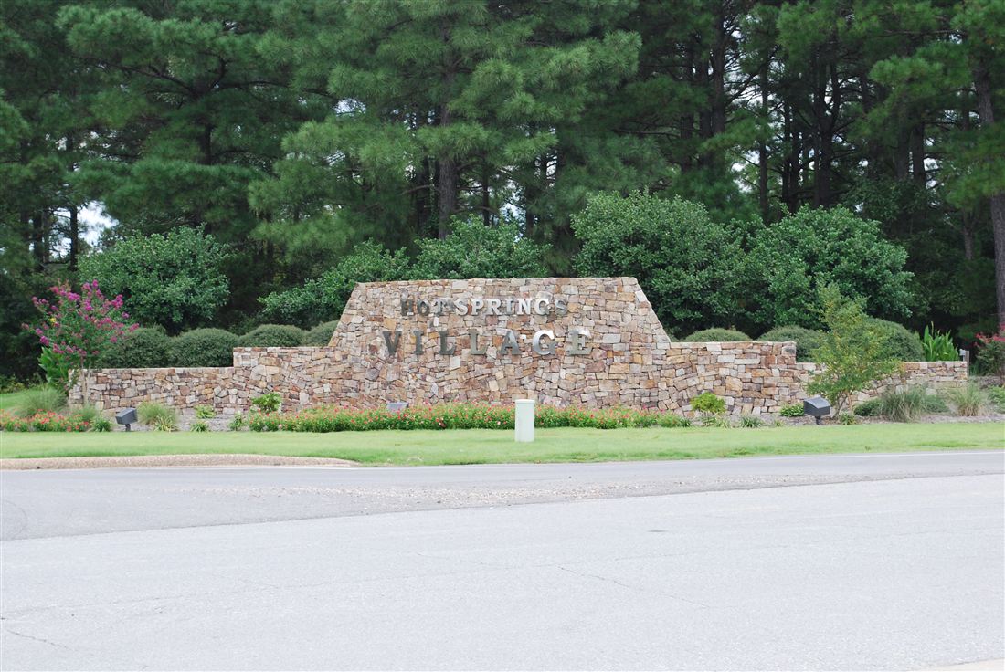 In its setting, the monument, plantings and lawn from the road