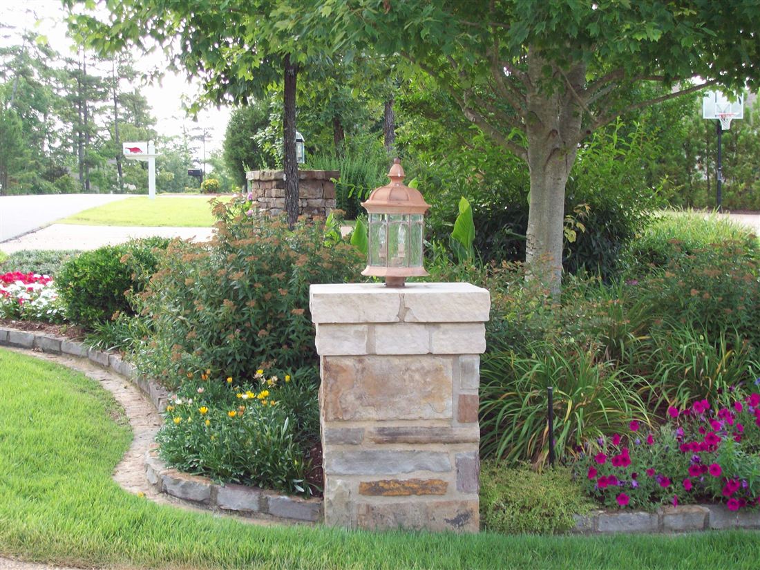 Island bed, lantern column, cut-stone edging
