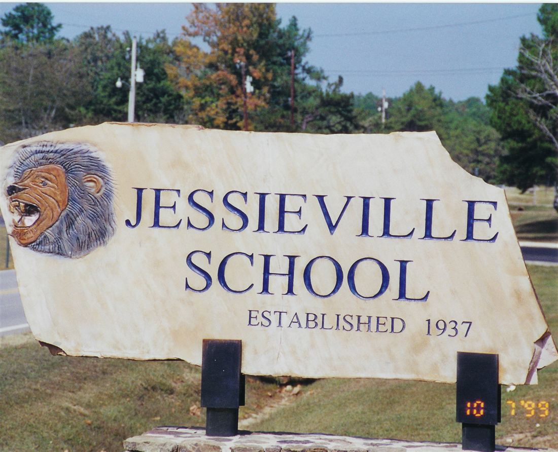 Jessieville School, engraved stone with lion