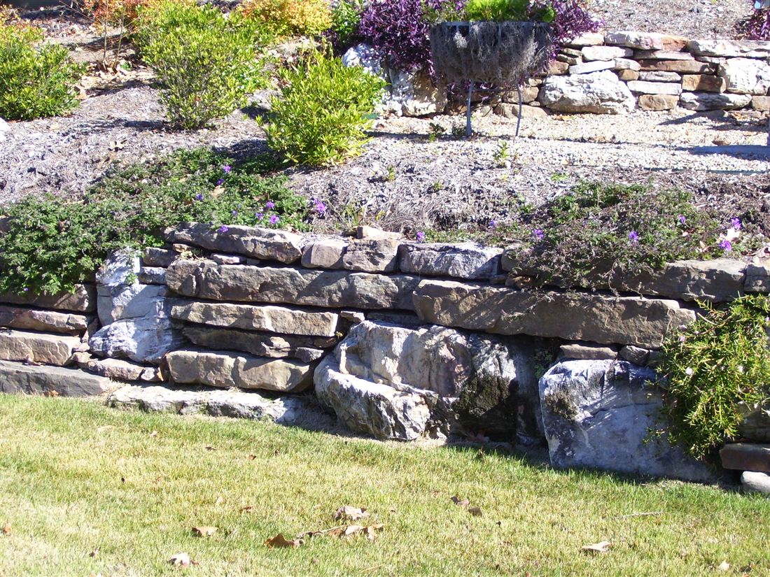 Lakeside terraces, dry-stack sandstone and boulders