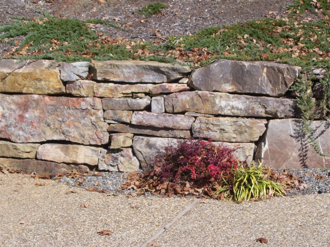 Low garden wall, dry-stack sandstone