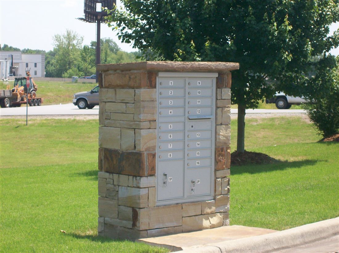 Mailbox kiosk, stone columns
