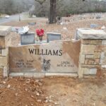 Memorial bench, with stone piers