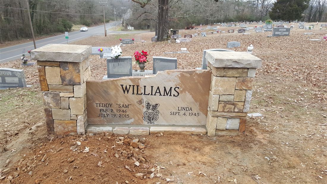 Memorial bench, with stone piers