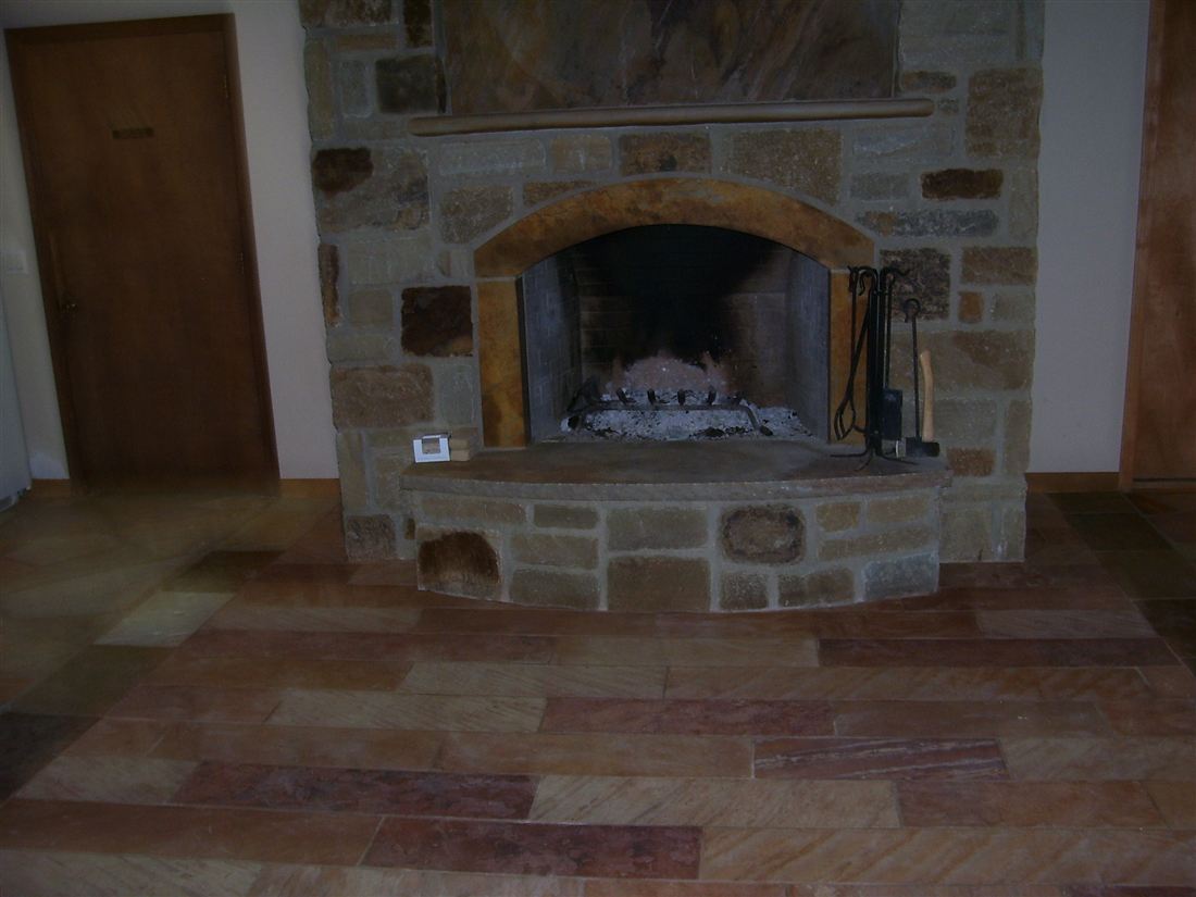 Our office, stone fireplace, slate plank floor