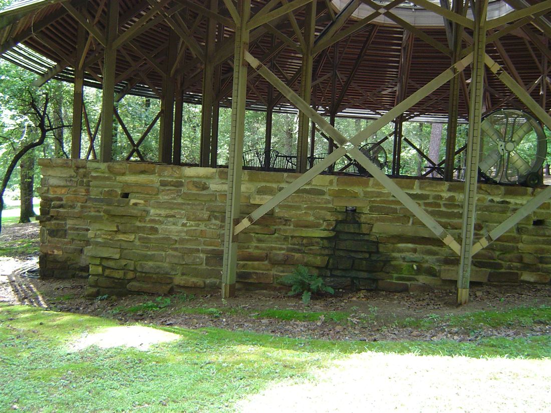Pavilion, ledge-stone walls under the timber roof