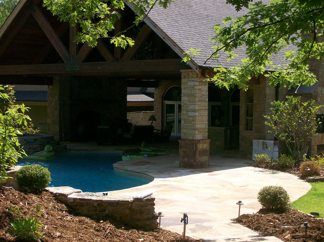 Pool, waterfall and timber pavilion