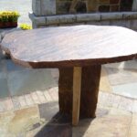 Slab table, on a flagstone patio