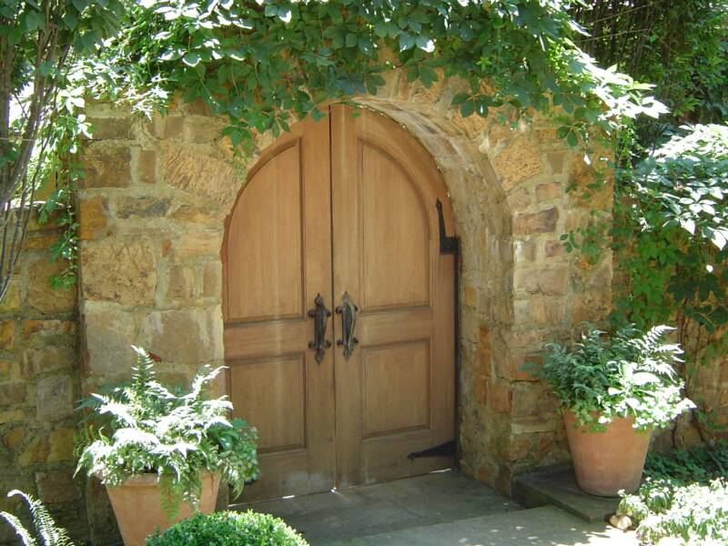 Stone arch, arched wood doors