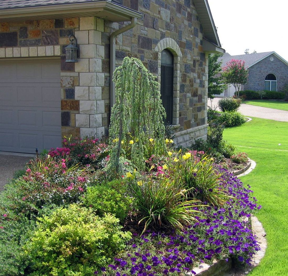 Stone corner, with flower beds