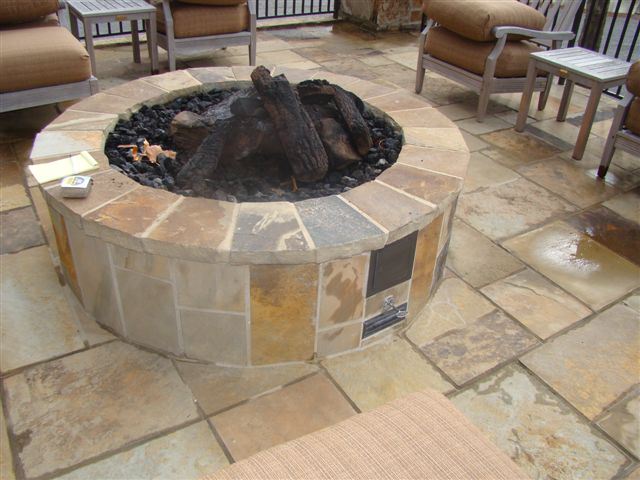 Stone fire pit, on flagstone