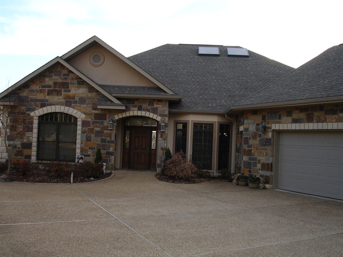 Stone house, arched entries