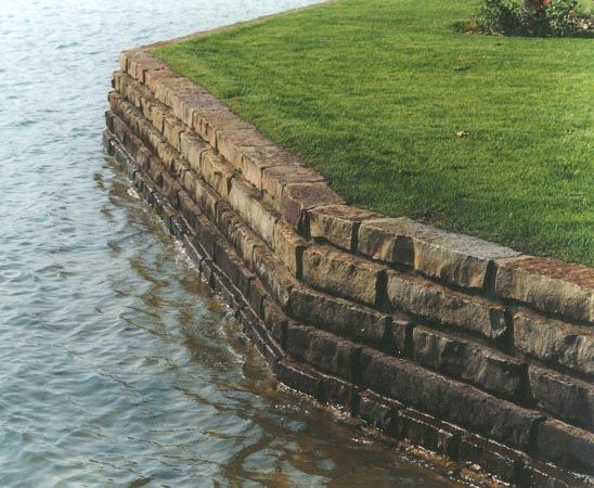 Stone seawall, lawn to the water