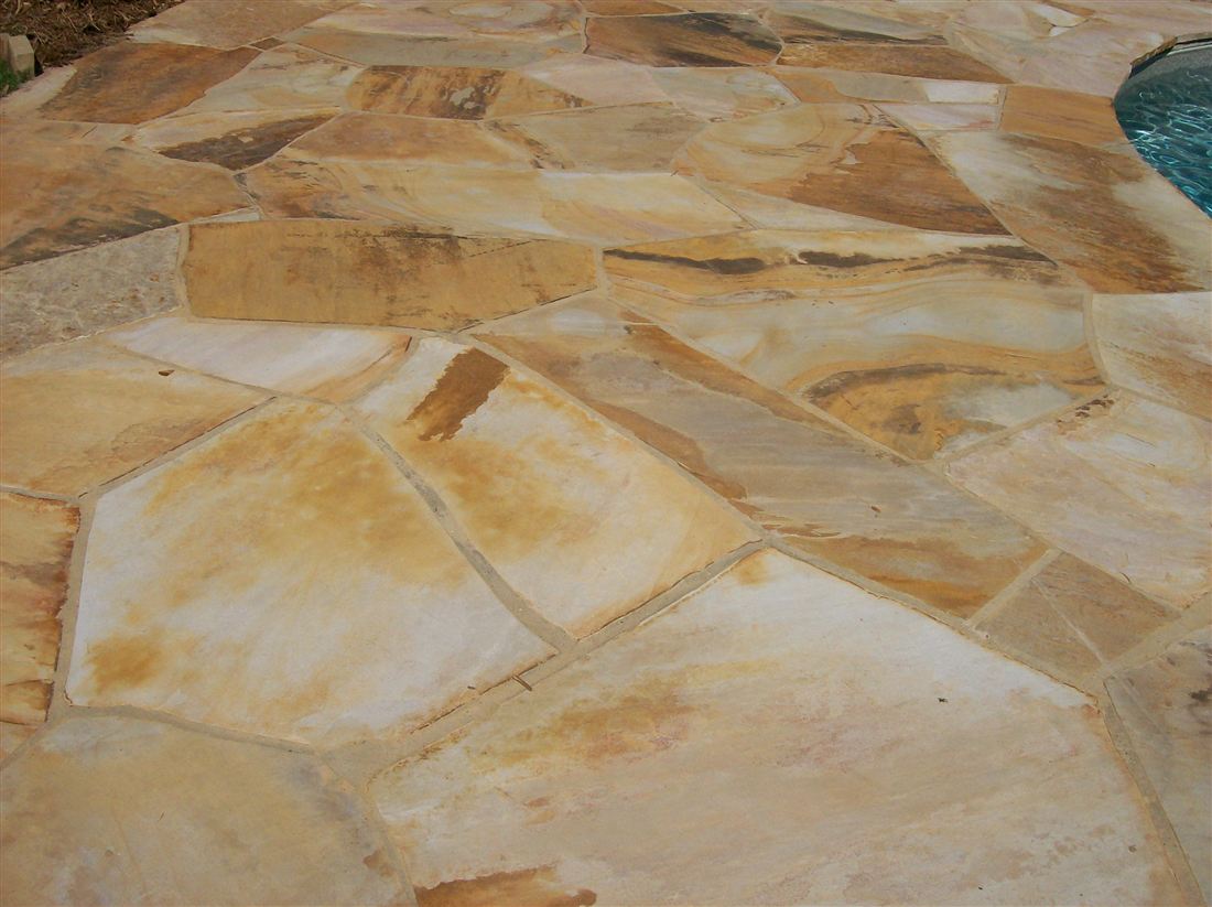 The floor, brown Ouachita flagstone