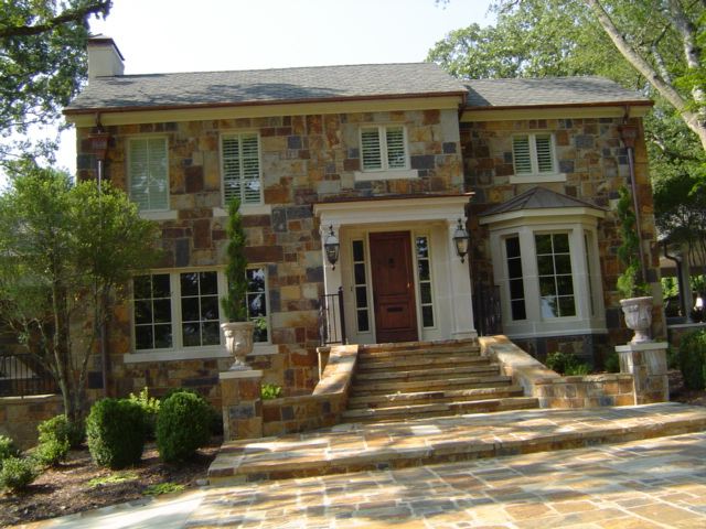 Two-story stone, flagstone steps