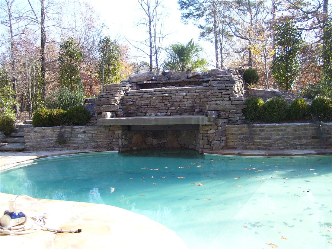 Winter view, pool and grotto from the lawn